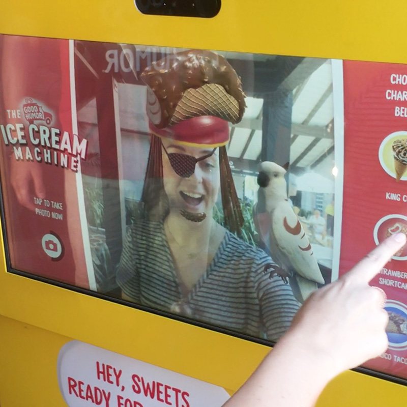 Close-up of the pirate parrot character overlay on the booth's touchscreen