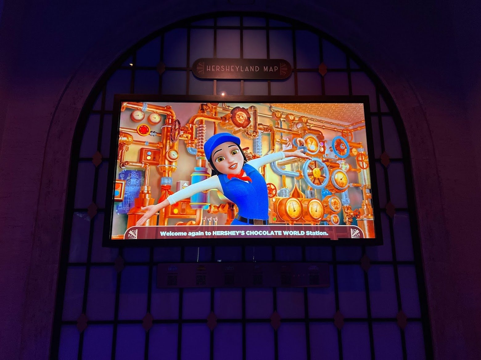 Animated station host welcoming guests to Hershey's Chocolate World Station