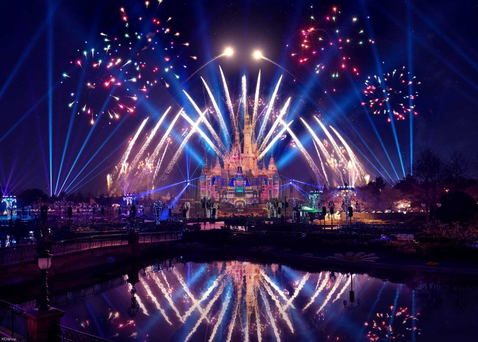 Fireworks finale reflected in the water in front of the castle